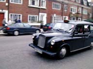 The cute, round figured London taxi cab